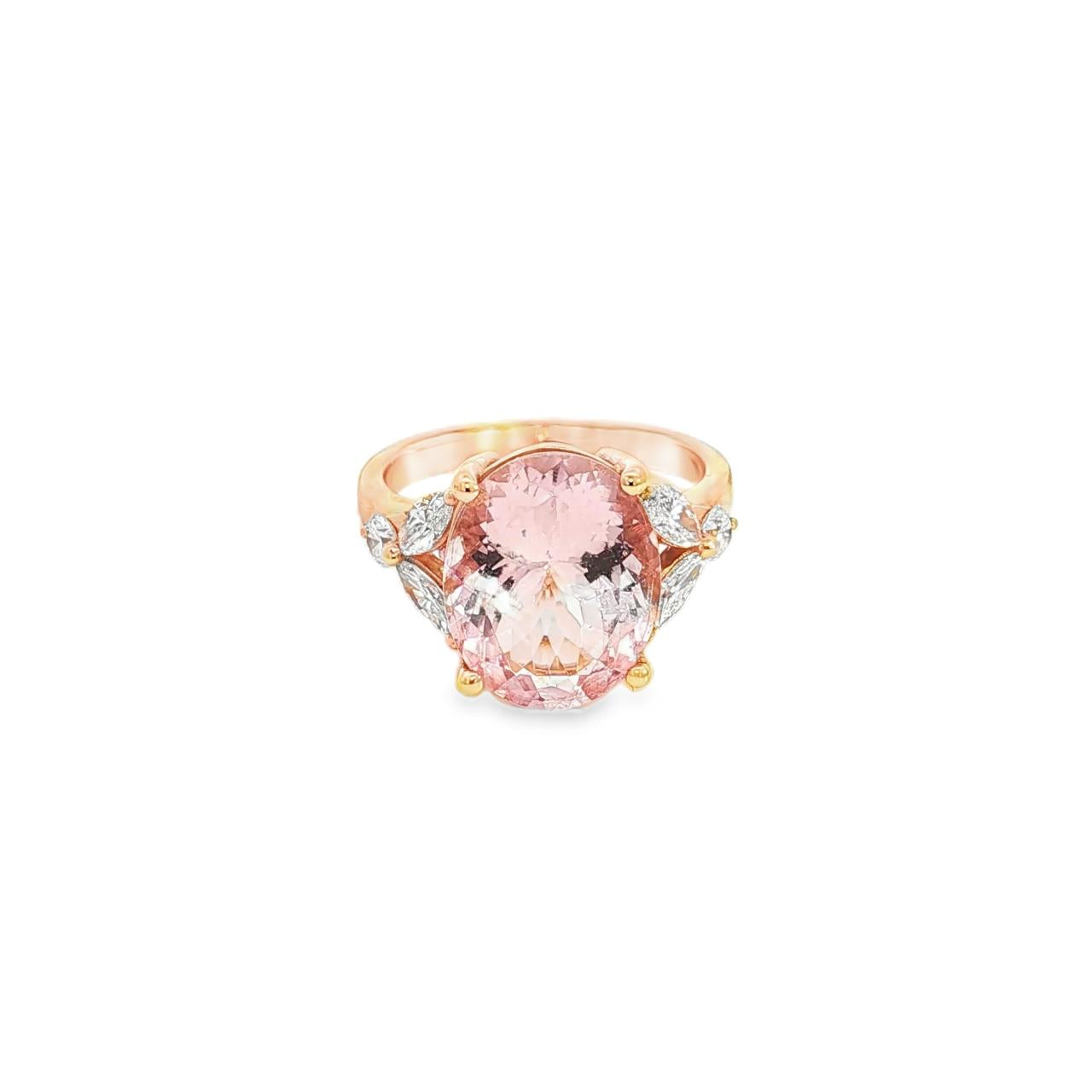 18ct rose gold ring featuring a 5.12ct oval morganite in a four-claw setting with marquise and round diamond accents and a post and bezel undercarriage.
