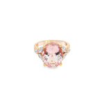 18ct rose gold ring featuring a 5.12ct oval morganite in a four-claw setting with marquise and round diamond accents and a post and bezel undercarriage.