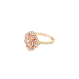 18ct rose gold ring featuring a 1.21ct emerald-cut morganite with marquise and round diamond accents and bead-set diamond shoulders.