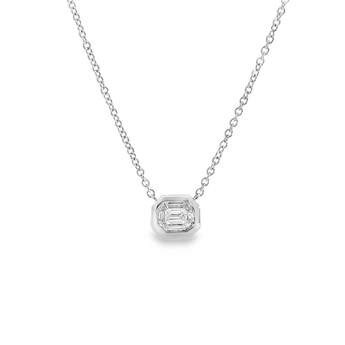 18ct white gold necklet featuring a horizontal octagonal cluster pendant with one emerald cut and eight tapered baguette cut diamonds on a 42cm fine cable link chain.