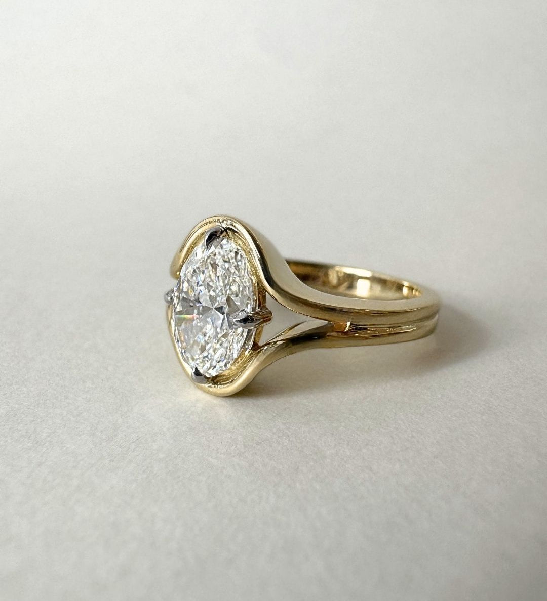 18ct yellow gold oval diamond ring with 1.81ct GIA certified diamond in NSEW claw setting