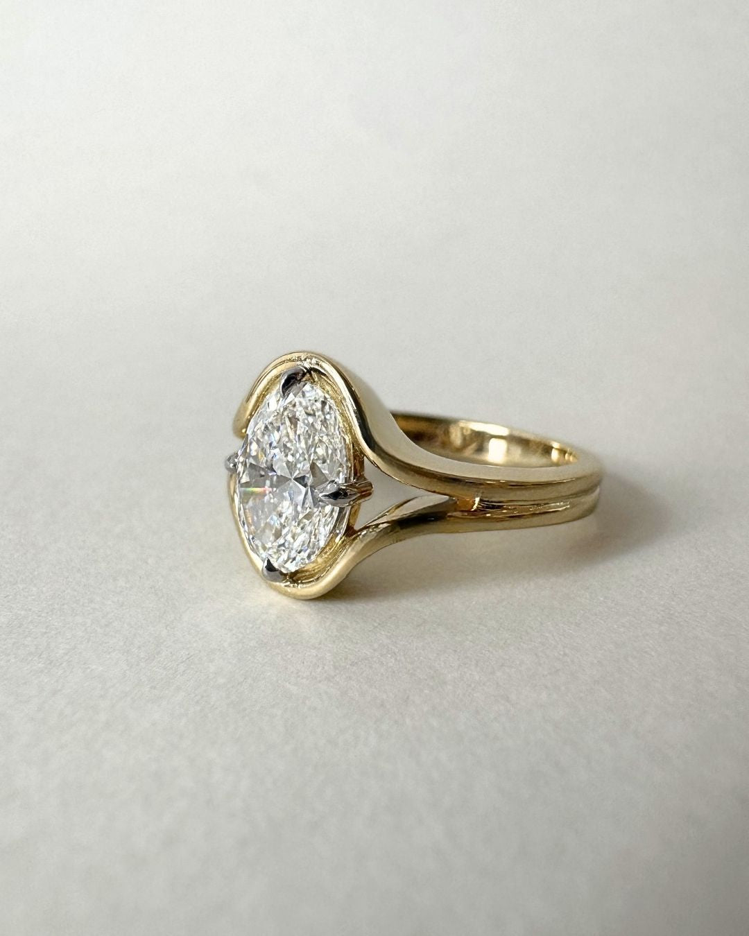 18ct yellow gold oval diamond ring with 1.81ct GIA certified diamond in NSEW claw setting