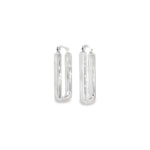9ct white gold 30 x 4.7mm oval hoop earrings featuring a polished finish with post and clip fittings.
