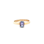 9ct yellow gold ring featuring a 9x5mm oval cut tanzanite in a four-claw setting with post and bezel collet.