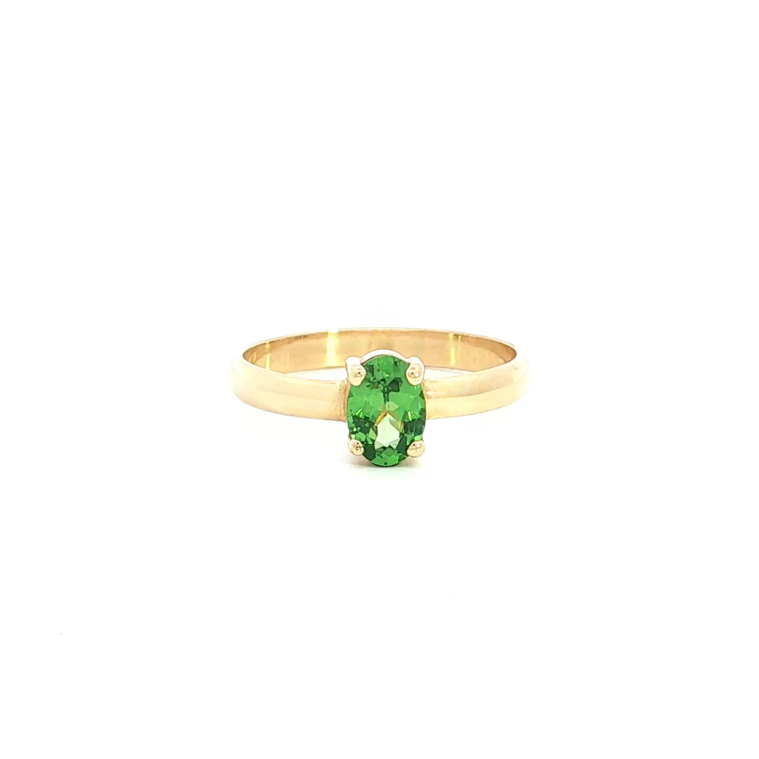 18ct yellow gold ring featuring a 7x5mm oval cut tsavorite in a four-claw setting with post and bearing collet.
