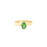 18ct yellow gold ring featuring a 7x5mm oval cut tsavorite in a four-claw setting with post and bearing collet.