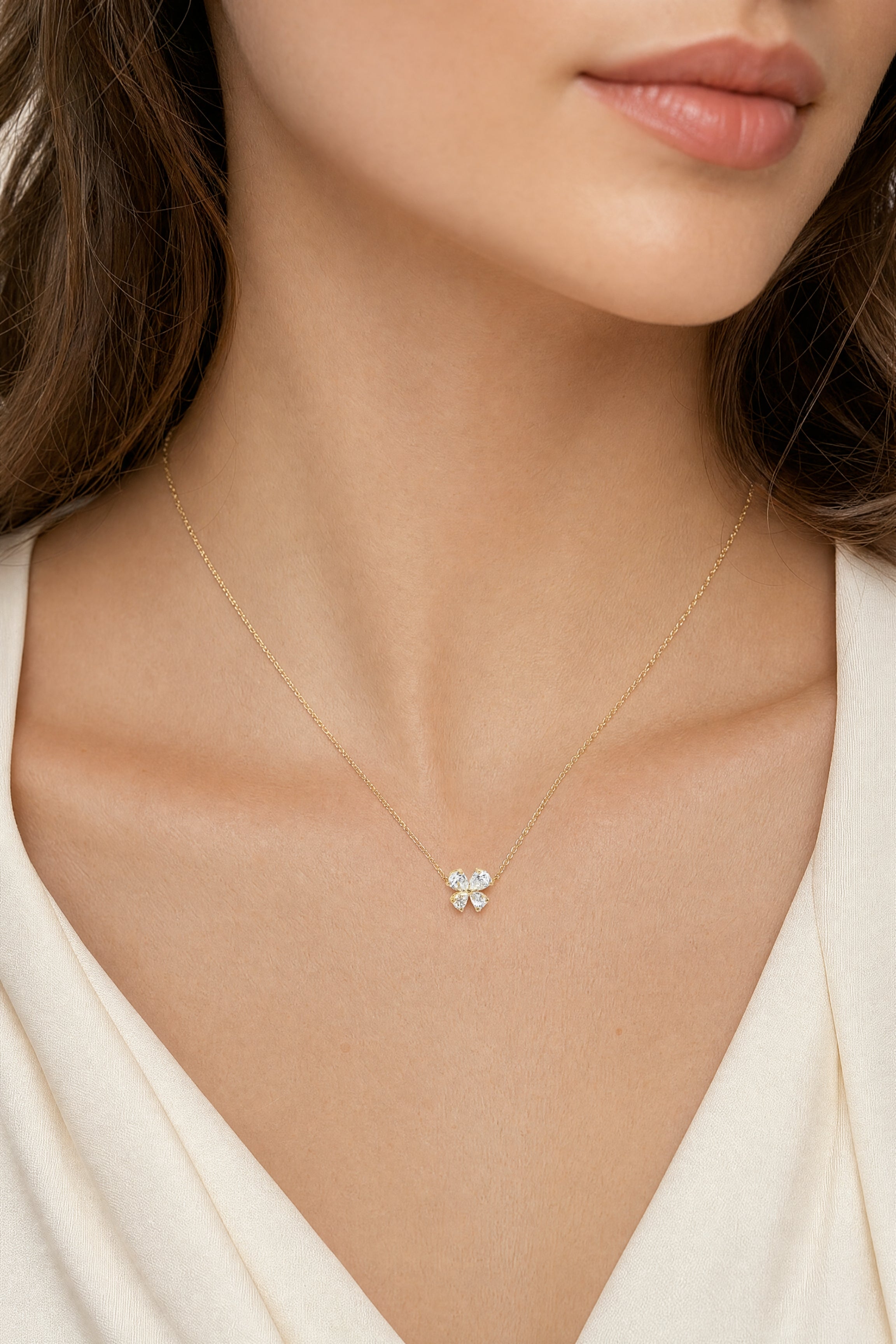 18ct yellow gold diamond necklace with pear cut diamonds arranged in offset clover cluster