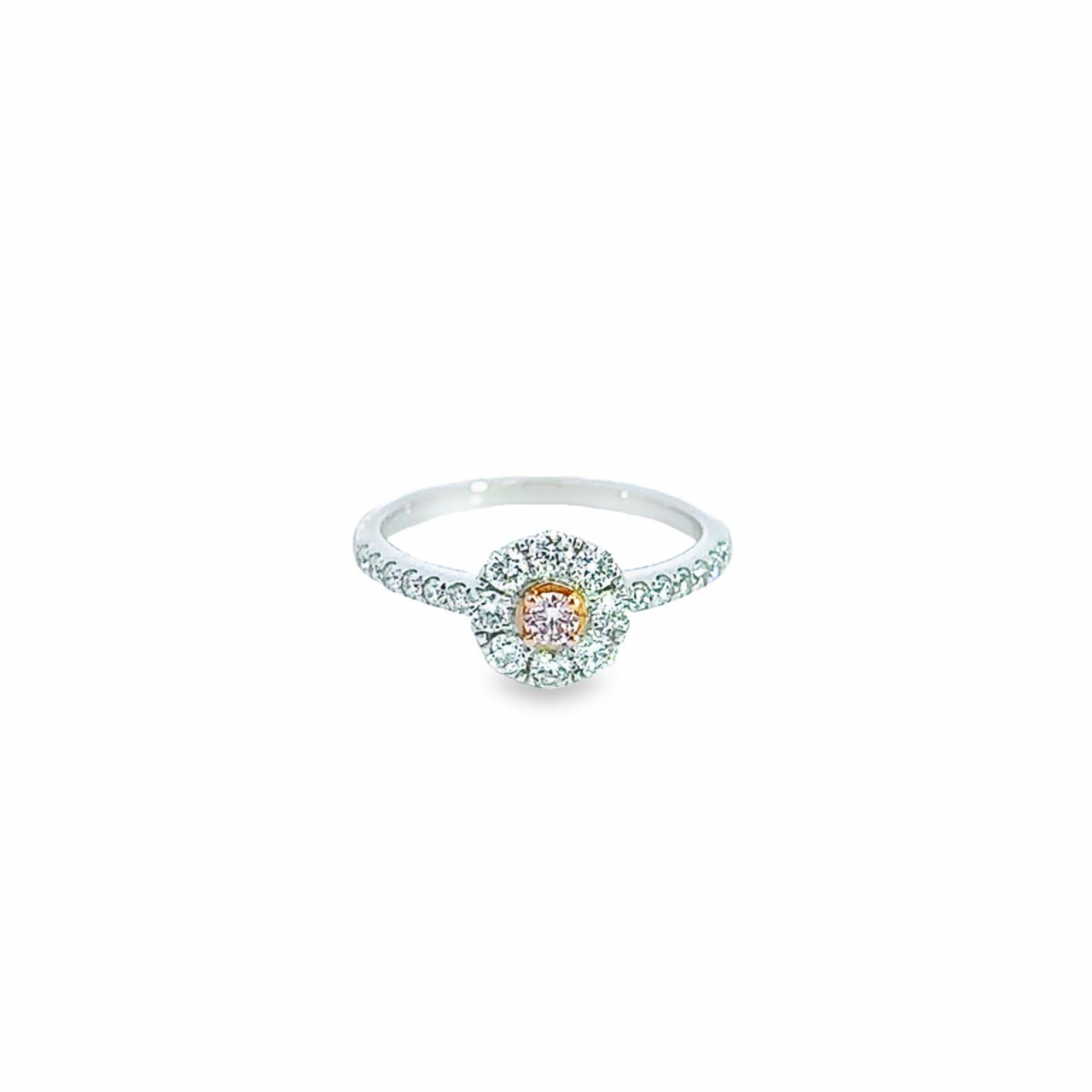 18ct white and rose gold pink and white diamond ring featuring a flower cluster design with central Argyle pink diamond and claw-set diamond shoulders.