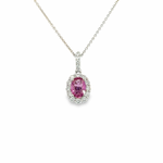 18ct white gold pendant featuring an oval pink sapphire in a four-claw setting with a multi-claw diamond halo and diamond-set pendant runner.
