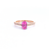 18ct rose and white gold ring featuring a 0.90ct oval cut pink spinel with diamond-set shoulders.