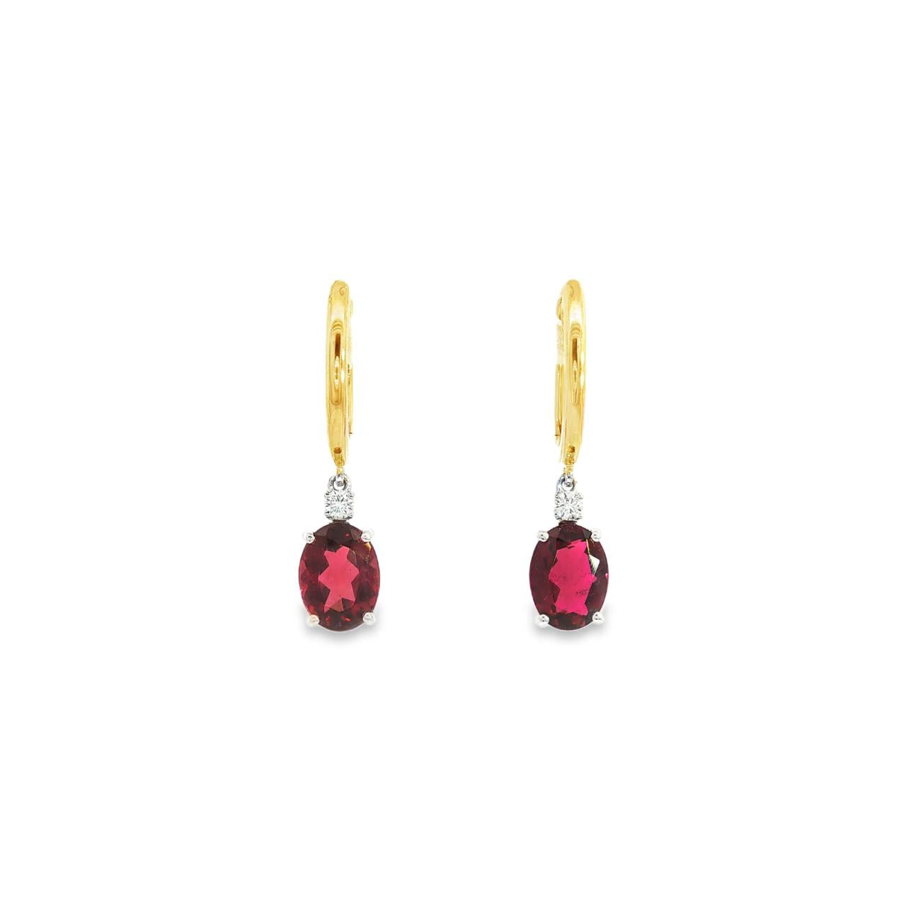 18ct yellow and white gold earrings featuring 8x6mm pink tourmalines and diamond accents in articulated double drop design with hinged huggie tops.