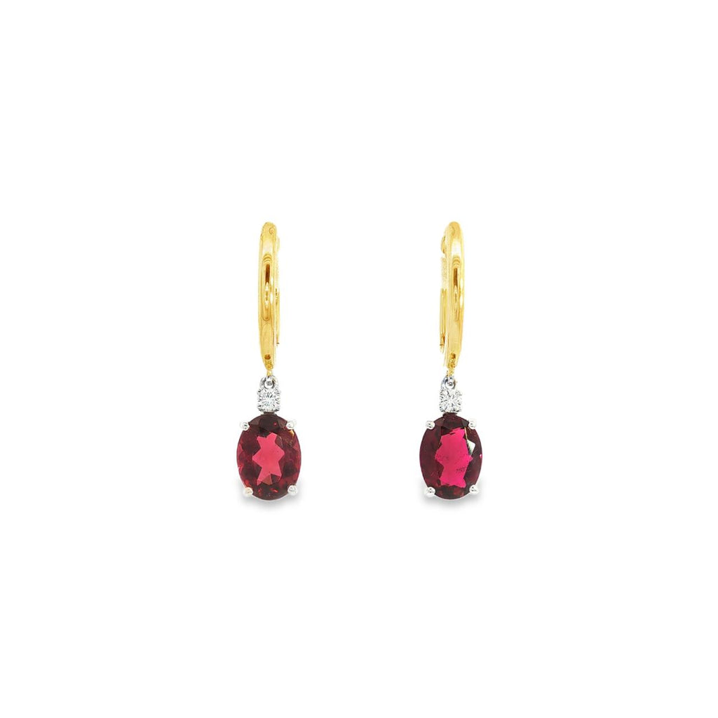 18ct yellow and white gold earrings featuring 8x6mm pink tourmalines and diamond accents in articulated double drop design with hinged huggie tops.