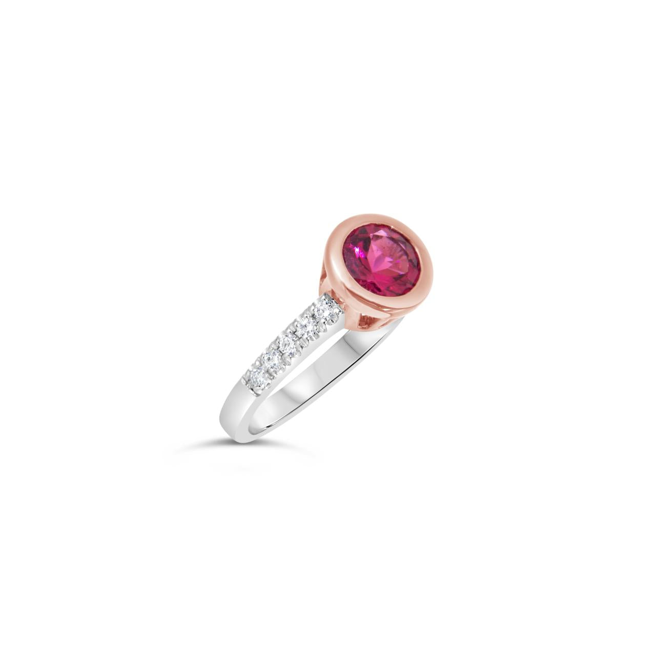 White and rose gold ring with round pink tourmaline and diamond-set shoulders.