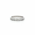platinum diamond band ring with oval cut diamonds in shared claw setting