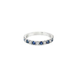Platinum band with alternating claw-set blue sapphires and diamonds.