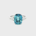 18ct white gold aquamarine ring with pear cut diamond side stones