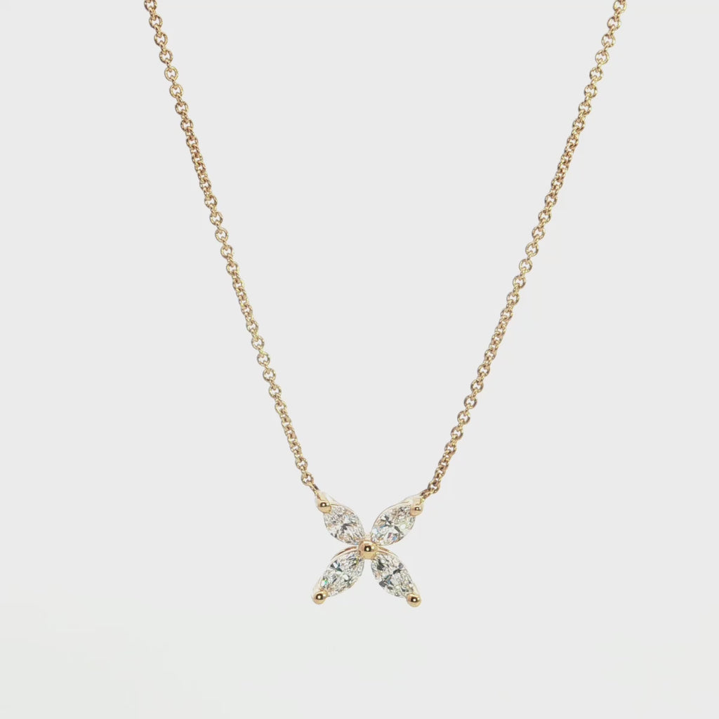 18ct yellow gold diamond necklace with marquise cut diamonds arranged in a star cluster