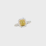 Two-tone 18ct yellow and white gold diamond ring with a 1.01ct Fancy Intense Yellow centre diamond and diamond cluster surround.