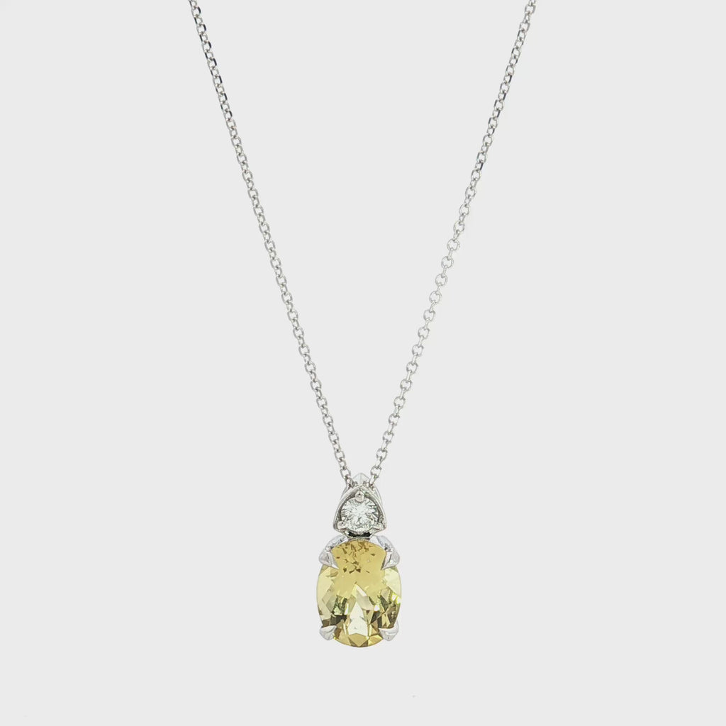 9ct white gold yellow beryl and diamond pastel pendant with oval gemstone and concealed runner.