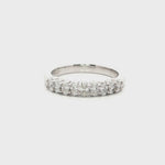 platinum diamond band ring with oval cut diamonds in shared claw setting