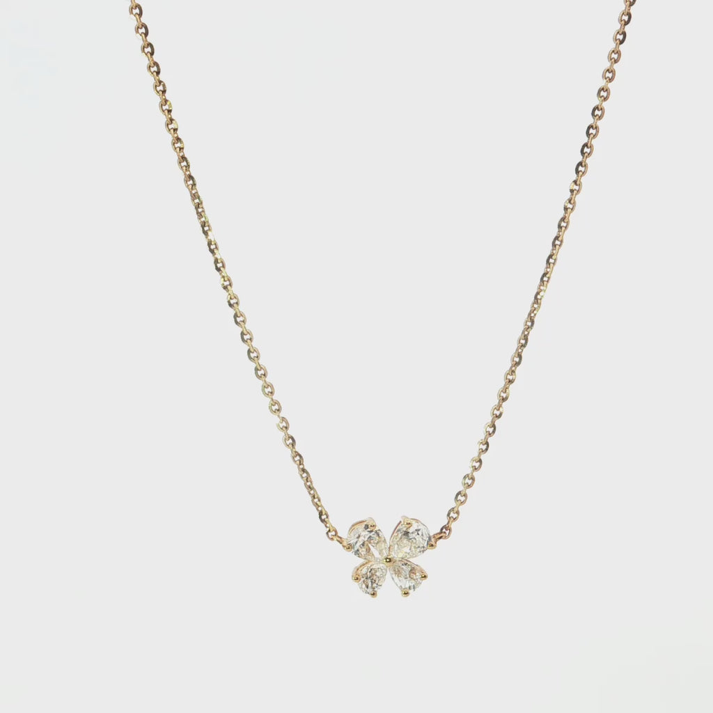18ct yellow gold diamond necklace with pear cut diamonds arranged in offset clover cluster