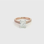 18ct rose gold and platinum diamond ring featuring a 1.50ct radiant cut centre diamond and diamond-set shoulders.