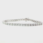 18ct white gold diamond tennis bracelet with large round brilliant cut diamonds in four claw settings