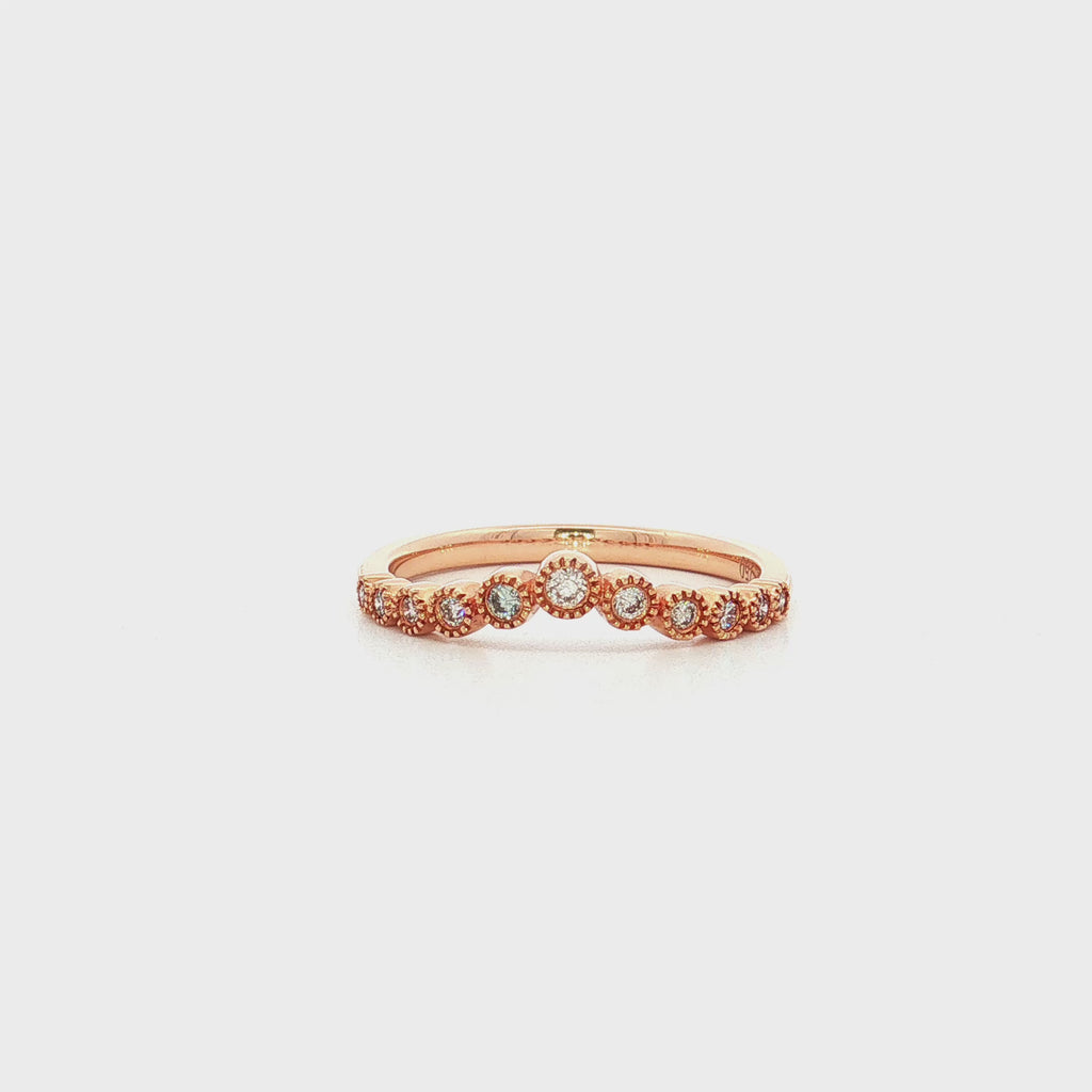 Graduating diamond curved band in rose gold