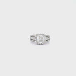 Platinum cushion cut diamond halo ring featuring a 2.00ct centre diamond with a halo surround and triple split diamond-set shoulders.