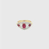 18ct yellow and white gold five-stone ruby and diamond ring featuring alternating claw-set gems with a pointed diamond surround.