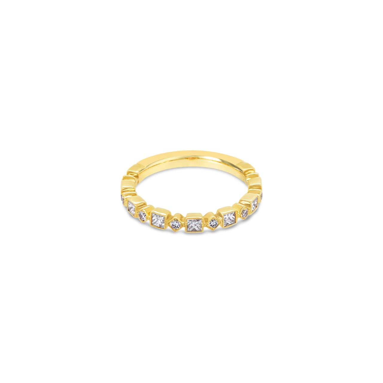 18ct yellow gold diamond ring featuring alternating offset and square settings with round and princess cut diamonds totalling 0.60ct.