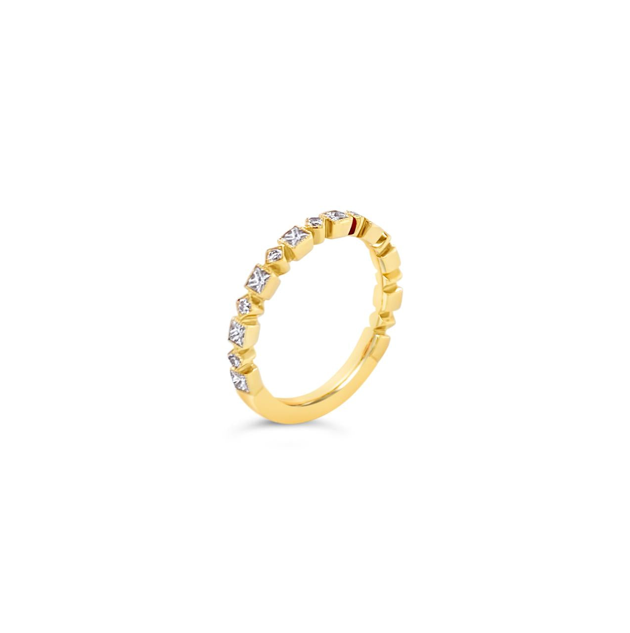 18ct yellow gold diamond ring featuring alternating offset and square settings with round and princess cut diamonds totalling 0.60ct.
