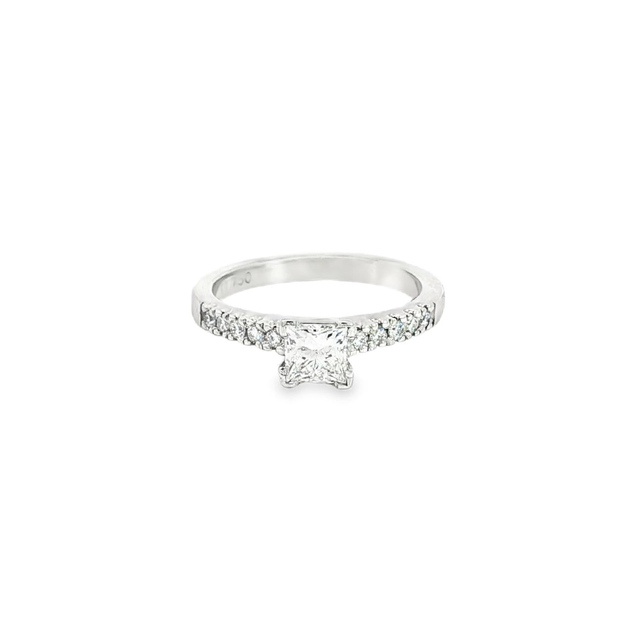 18ct white gold diamond ring featuring a 0.51ct princess cut diamond with ten round brilliant cut diamond accents.