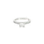 18ct white gold diamond ring featuring a 0.51ct princess cut diamond with ten round brilliant cut diamond accents.