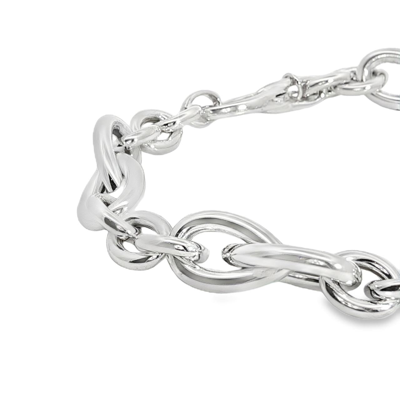 Sterling silver Quinn bracelet featuring oval links and double pear-shaped feature links, secured with a parrot clasp.