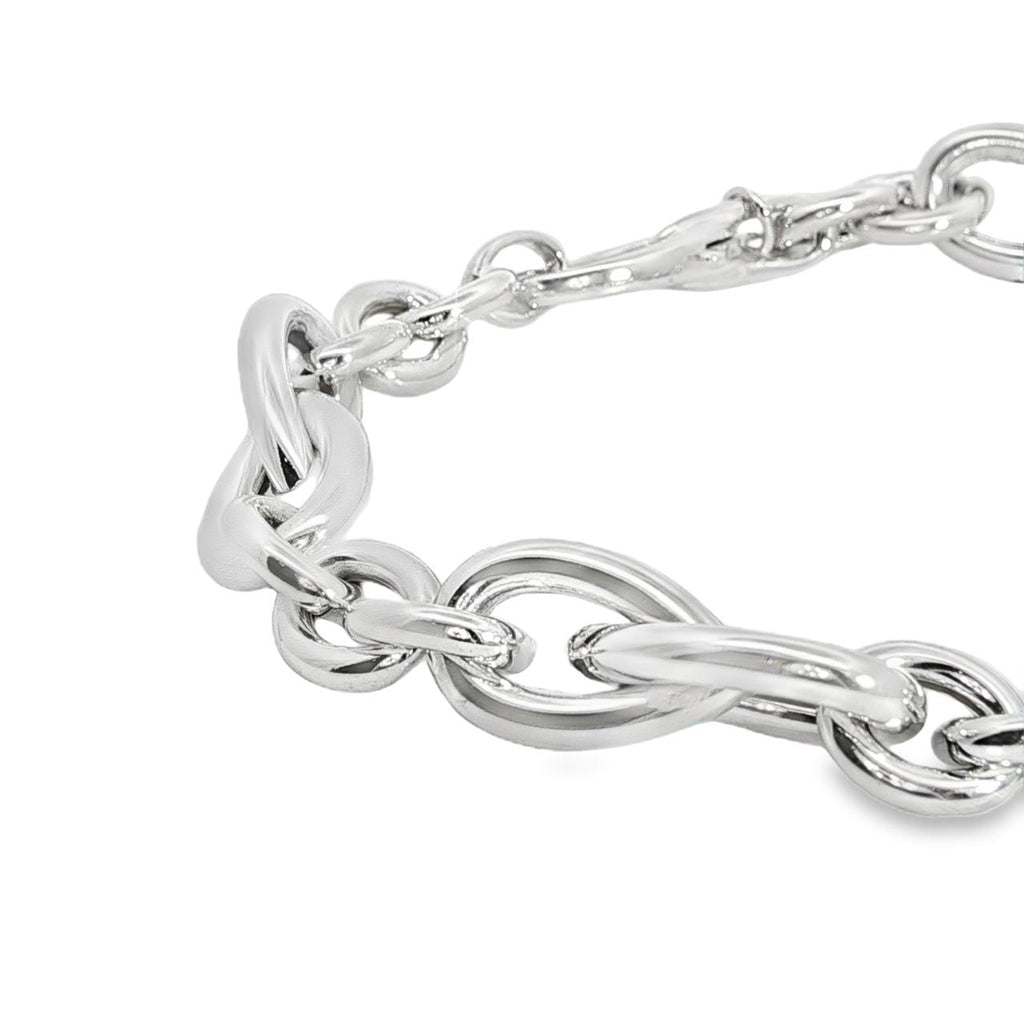 Sterling silver Quinn bracelet featuring oval links and double pear-shaped feature links, secured with a parrot clasp.