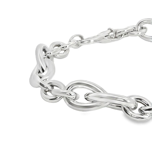 Sterling silver Quinn bracelet featuring oval links and double pear-shaped feature links, secured with a parrot clasp.