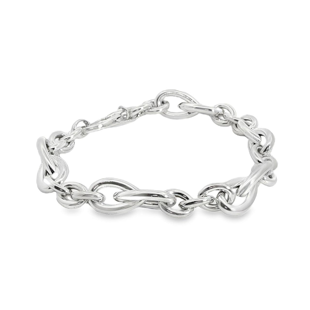 Sterling silver Quinn bracelet featuring oval links and double pear-shaped feature links, secured with a parrot clasp.