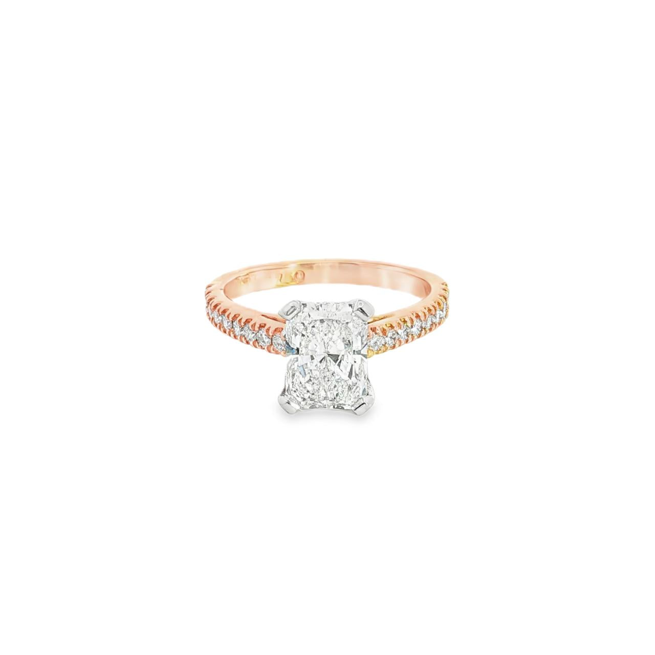 18ct rose gold and platinum diamond ring featuring a 1.50ct radiant cut centre diamond and diamond-set shoulders.