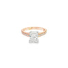 18ct rose gold and platinum diamond ring featuring a 1.50ct radiant cut centre diamond and diamond-set shoulders.