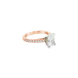 18ct rose gold and platinum diamond ring featuring a 1.50ct radiant cut centre diamond and diamond-set shoulders.