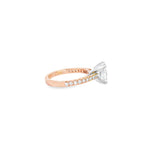 18ct rose gold and platinum diamond ring featuring a 1.50ct radiant cut centre diamond and diamond-set shoulders.