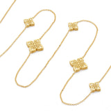 Roberto Coin Arabesque Flower 18ct yellow gold 85cm necklet featuring diamond-set flower motifs spaced along the chain and signature ruby clasp.