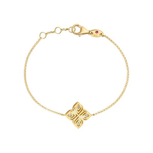 Roberto Coin Arabesque Flower 18ct yellow gold bracelet featuring central flower motif with diamond-set petals and signature ruby clasp.