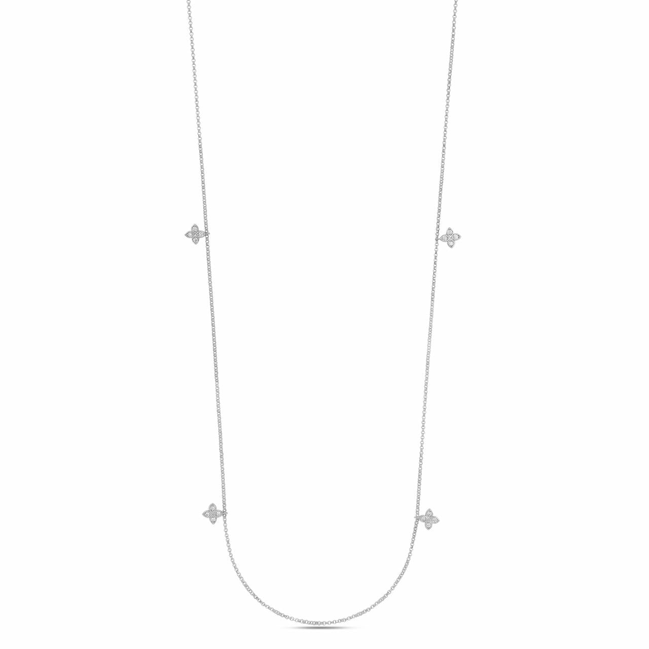 Roberto Coin Love By The Yard 18ct white gold diamond necklet featuring six flower-shaped diamond drops spaced along a fine belcher link chain with signature ruby clasp.