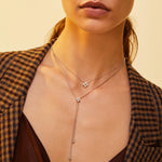 Roberto Coin Love In Verona 18ct rose gold diamond necklet featuring an adjustable diamond-set flower slider on a ball link chain with beaded ends and signature ruby on the reverse.