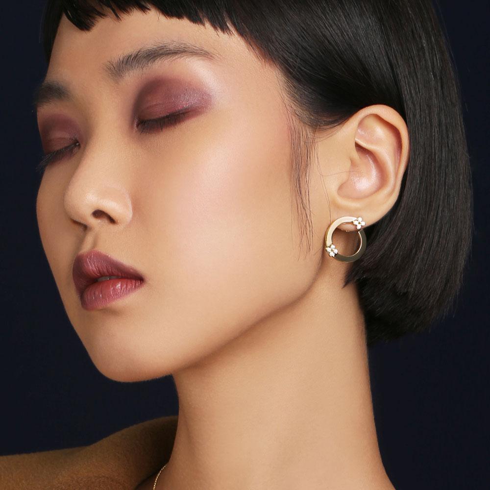 Roberto Coin Love In Verona 18ct white gold open hoop earrings with diamond flower motifs and hidden rubies.