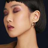 Roberto Coin Love In Verona 18ct white gold open hoop earrings with diamond flower motifs and hidden rubies.