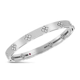 Roberto Coin Love in Verona 18ct white gold diamond bangle with flower cluster settings, engraved floral motifs, and two signature rubies set inside the clasp.