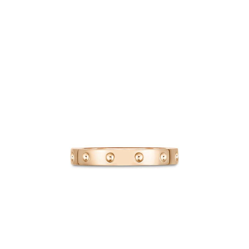Roberto Coin Pois Moi ring in 18ct rose gold featuring a 3.25mm wide band with polished finish, signature dimple design, and hidden ruby inside the band.